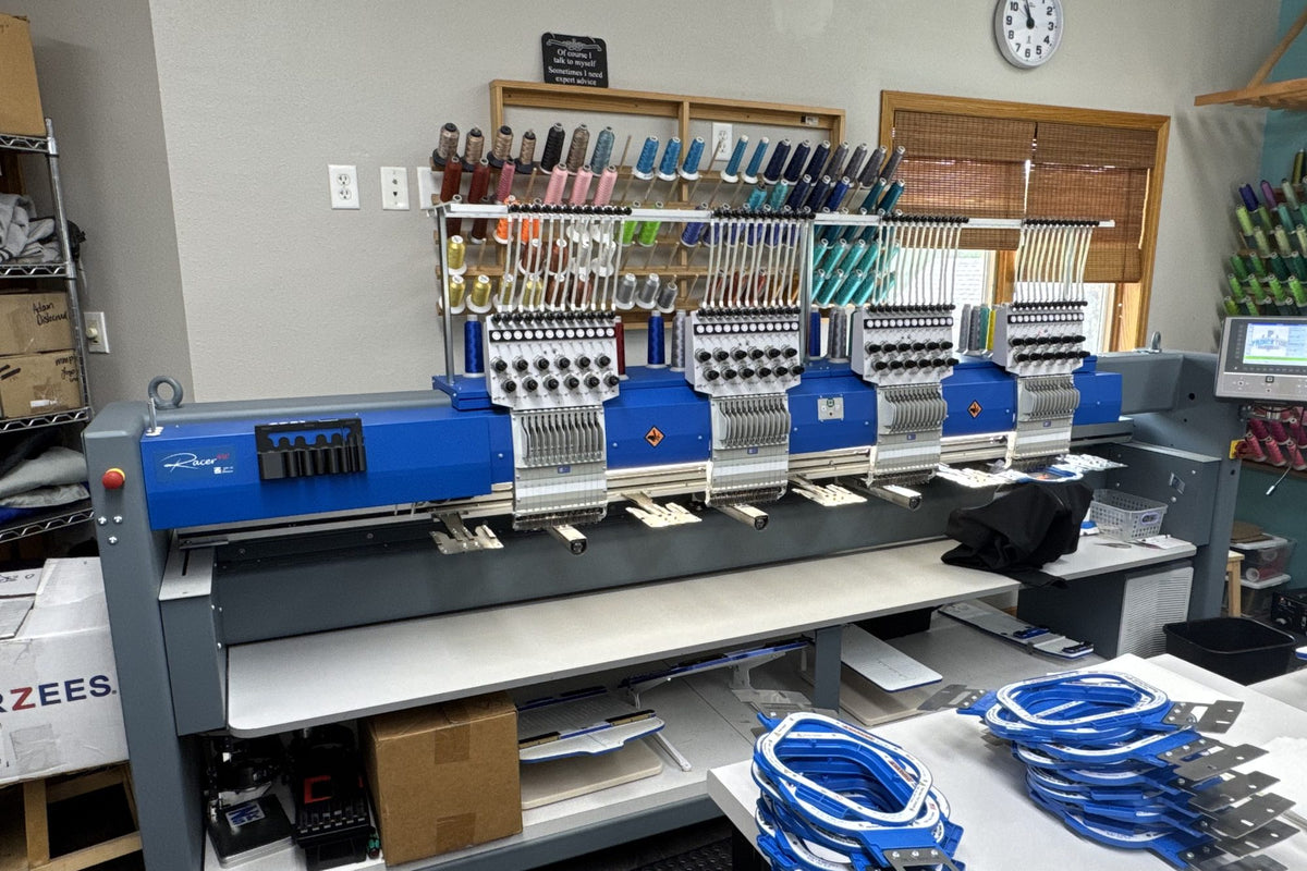 ZSK four-head embroidery machine in an embroidery shop
